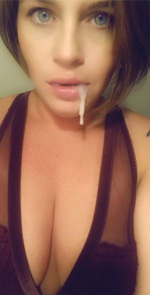 u/whit_jane with a dripping mouthful of cum