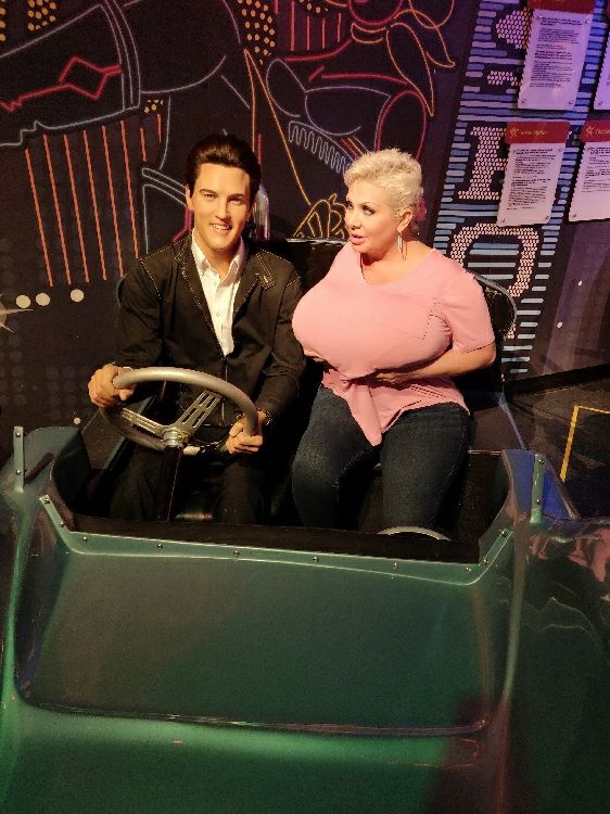 Claudia Marie showing early Elvis Presley what a set of 50 J fake titties look like