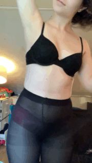 Cute baby in black pantyhose