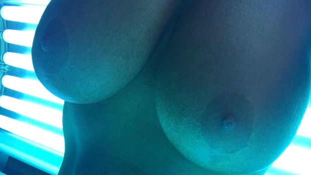 Big tanning bed boobs