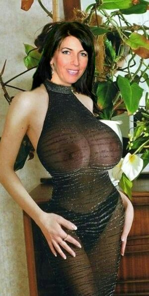 Hot brunette babe in see through dress