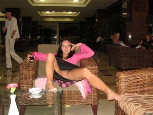 Sexy lady lounging at the bar