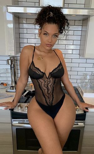 Stunning ebony in black lingerie