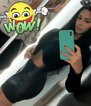 Amazing ass in black skirt