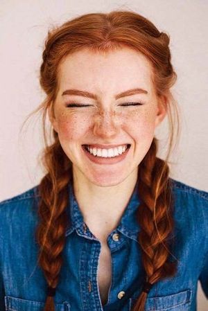 Happily smiling redhead