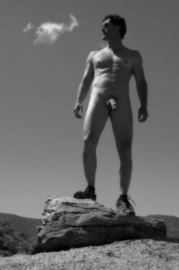 artistic shot of nude male outdoors