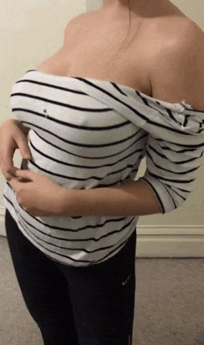 a sexy way to strip down her top