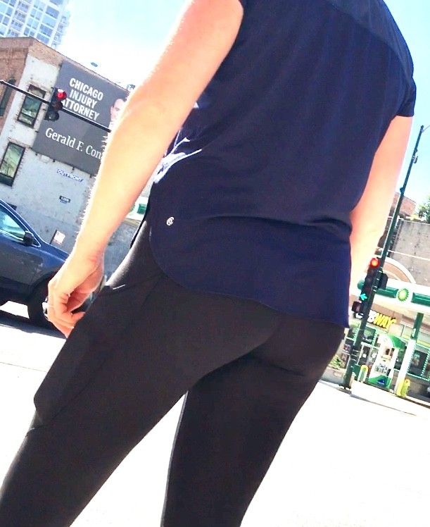 Chick in leggings crossing street