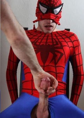 Spiderman (Johnny Leeks) getting his huge cock stroked while tied up