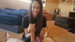 Brunette teen giving handjob