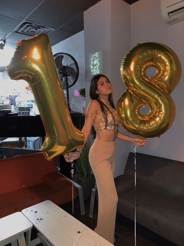 Sexy brunette in a tight dress on her 18th birthday