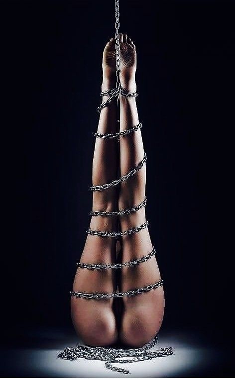 Babe in bondage chained up