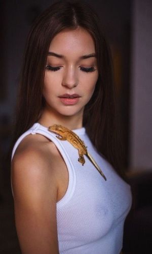 Brunette with see-through shirt showing off tits