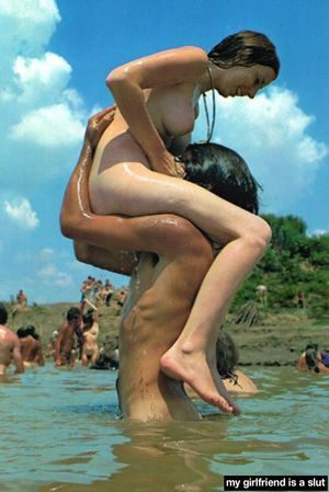 Grrrlfriend frolicking with some guy at the naked beach party