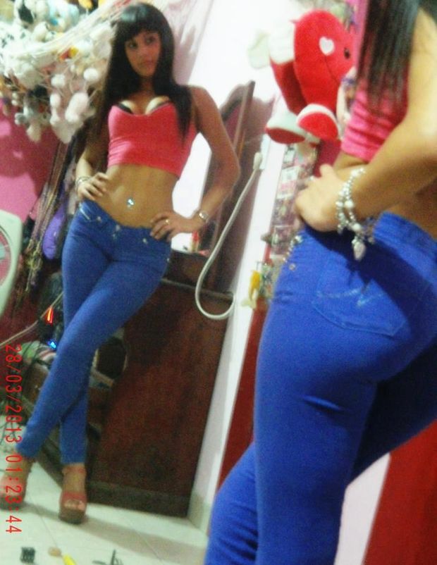 Sexy latina in front of a mirror