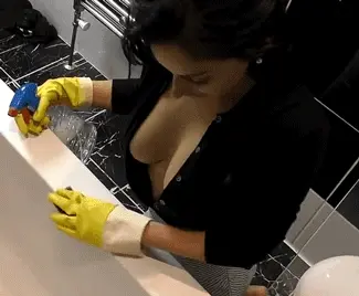 Cleaning the tub with my blouse open