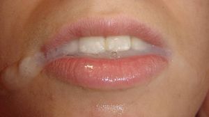 Leting it run down her cheeks.