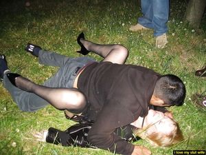 Wife enjoys an evening stroll in the park.