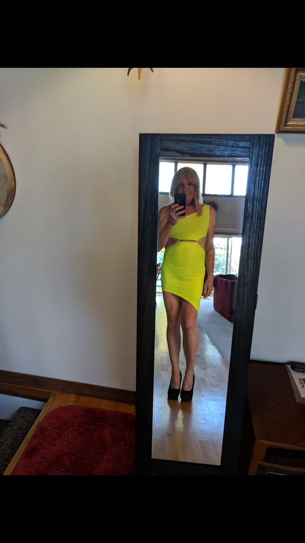 Shemale in a club dress and high heels