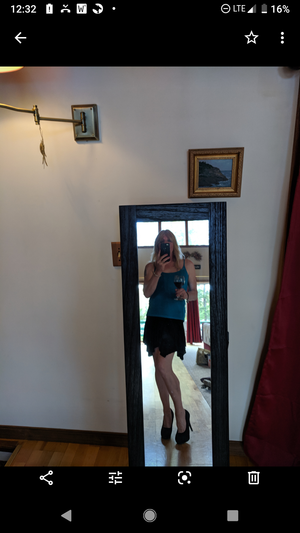 Shemale Janey in a skirt and high heels