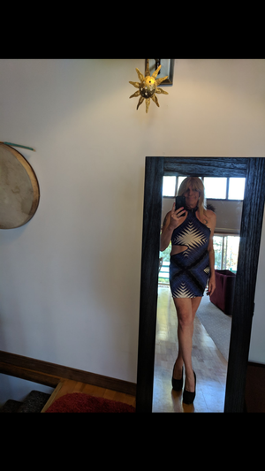 Shemale Janey in a club dress