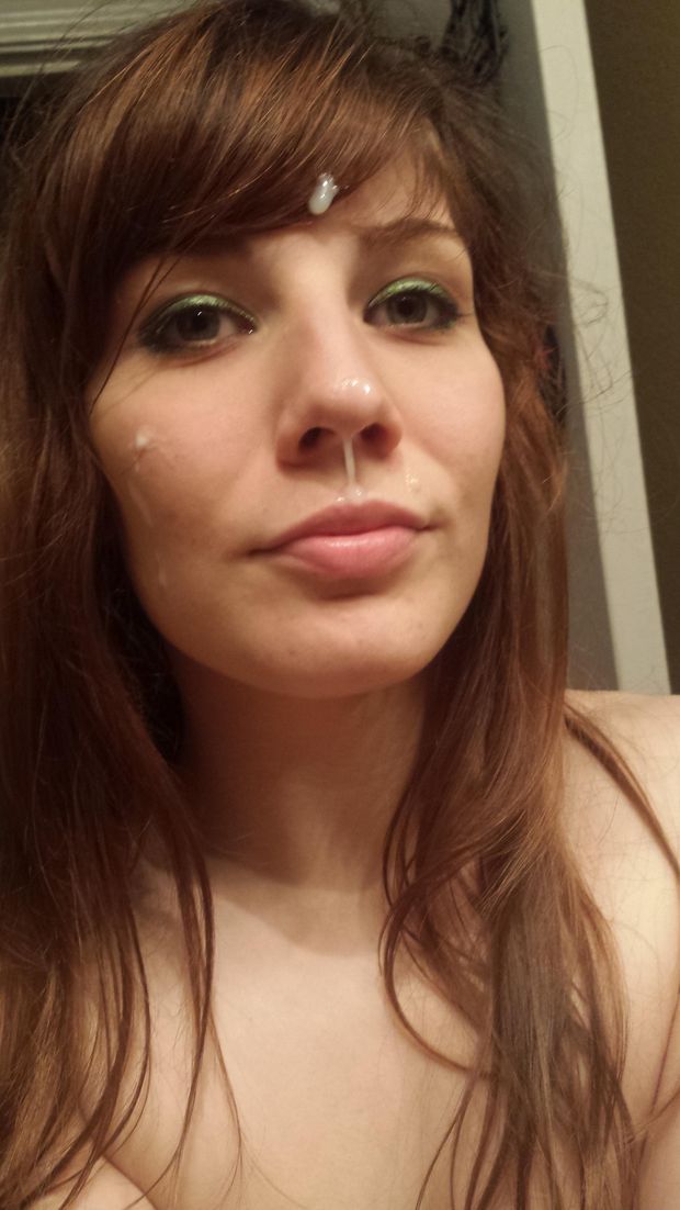 A lovely, fresh amateur face but...she has cum on her face and is having her photo taken.