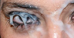 She is looking directly through thick cum right at you..