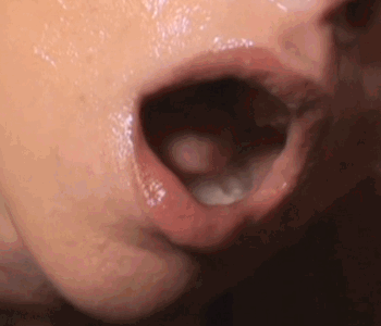Holding her head rto the side to catch cum as it runs down.