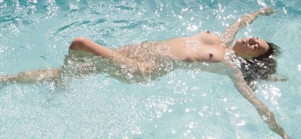 Tiny nipples floating in pool