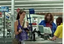 She has to know her boob is out....
