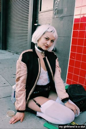 Collared grrrlfriend left on the sidewalk