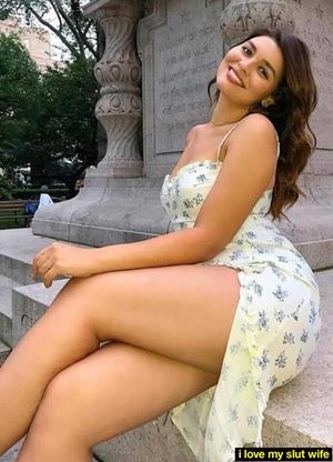 Flirtatious hot wife smiles and shows legs for bboys to see