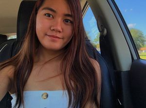 Sexy Asian in car and sexy clothes