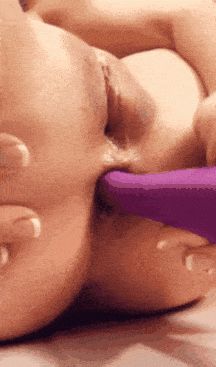 Purple toy in her ass
