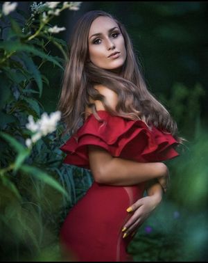 Hot brunette in red dress