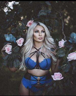 Blonde milf in black and blue lingerie