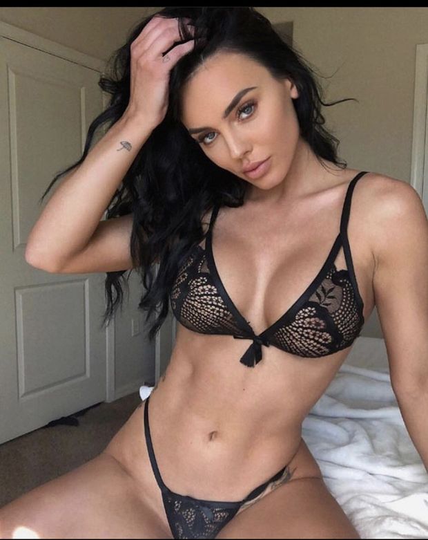 Hot brunette teen in black laced lingerie