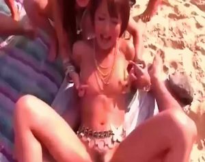Asian Squirting On A Beach