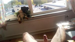 Hardon w spread naked legs above square w people