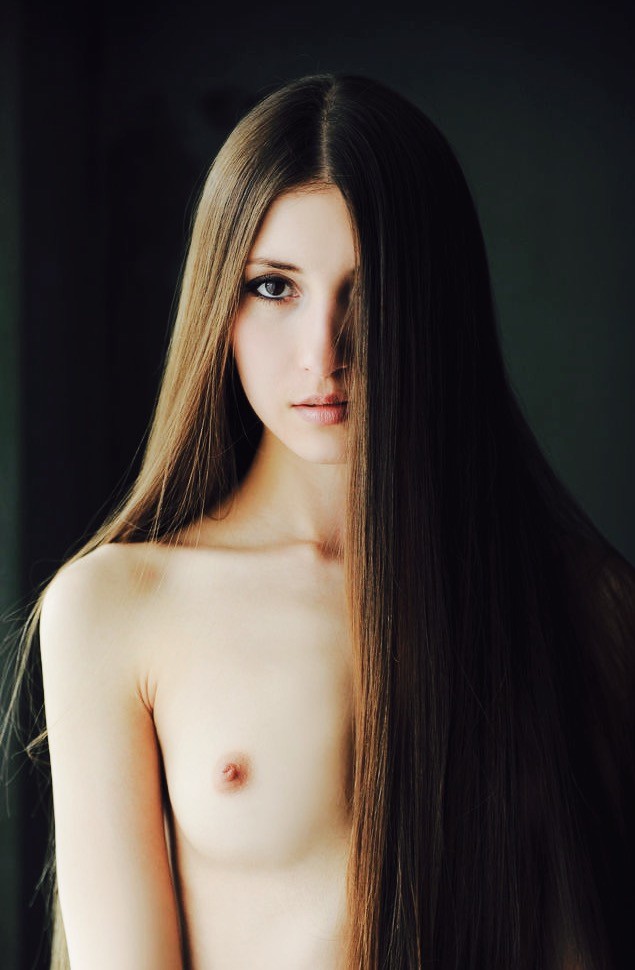 Long haired babe topless