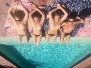Topless tanning group