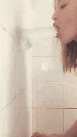 Shower dildo suck