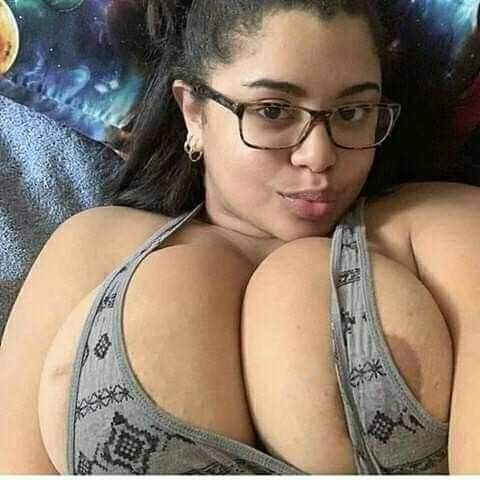 Barely nude hot mama with huge tits