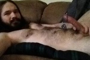 Laying on my couch, rock hard and spun out. Wishing I had some plump fuck holes to pound out