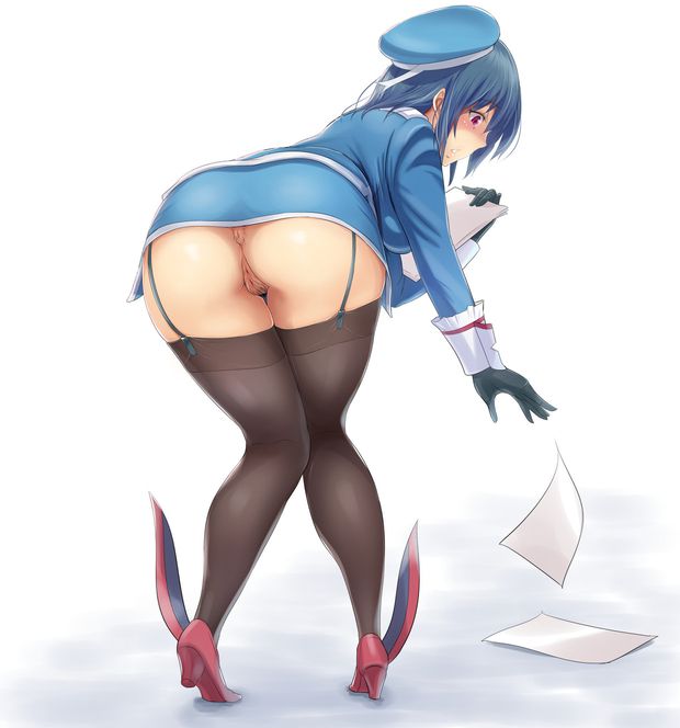 Pantyless airline attendant bending over