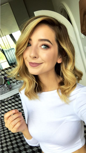 Zoella with another tight shirt