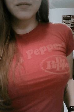 smiling red top big tits pierced nipple