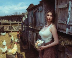 Around back, you find a braless farm hand holding a basket of eggs.
