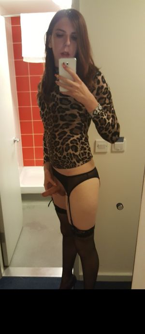 Leopard lingerie trap showing off her hard dick.