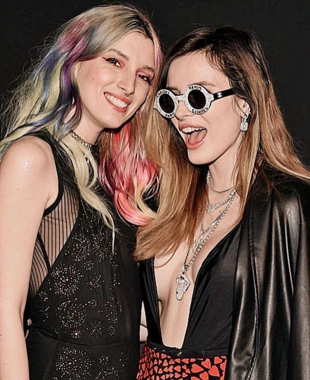 Bella Thorne braless boobs showing off nice cleavage with Dani Thorne.